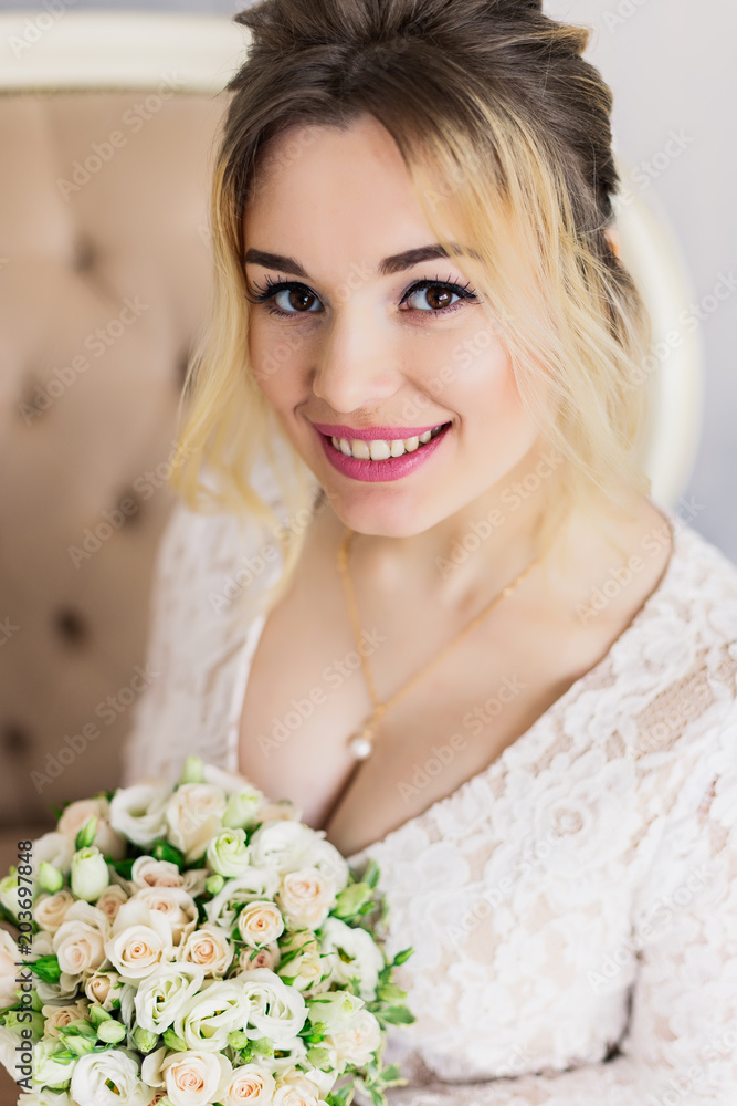 Beautiful woman in wedding dress in photo studio. Beautiful woman in wedding dress in photo studio.
