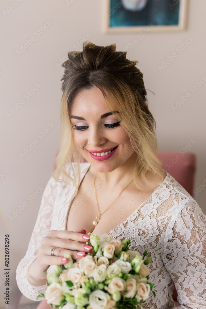 Beautiful woman in wedding dress in photo studio. Beautiful woman in wedding dress in photo studio.
