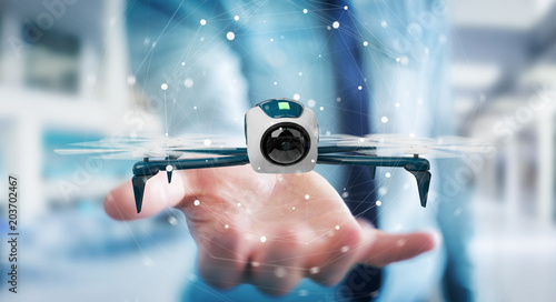 Tablou canvas Businessman using modern drone 3D rendering