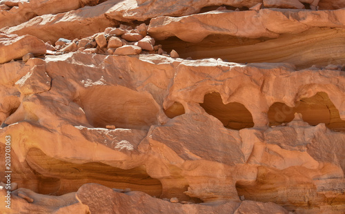 fragment of sandstone rock, the unusual shape of rocks was given by water and wind, colored canyon, Nuweiba, Egypt