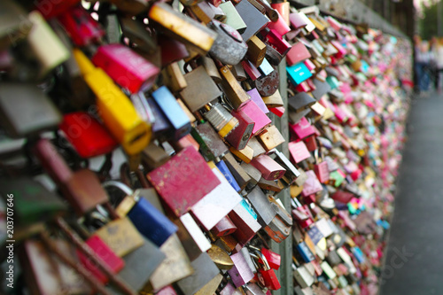 colorful love locks with some names