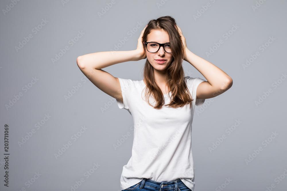 No way. Portrait of pretty, surprised, shocked woman touching head with two hands isolated on grey background No way. Portrait of pretty, surprised, shocked woman touching head with two hands isolated on grey background