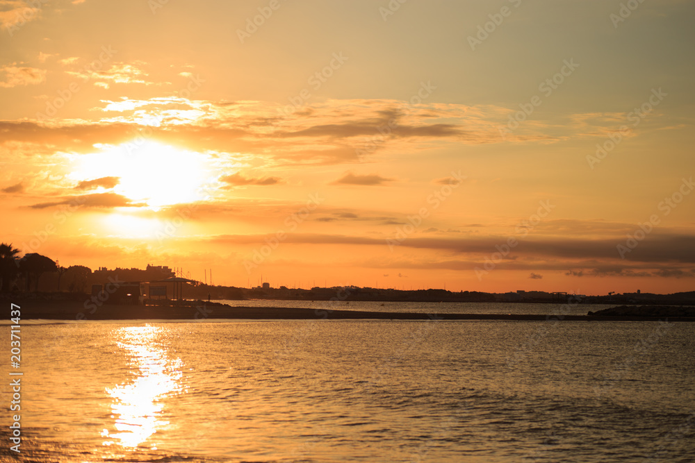 Beautiful sea sunset on the beach.  Sunset background. Travel vacations concept.