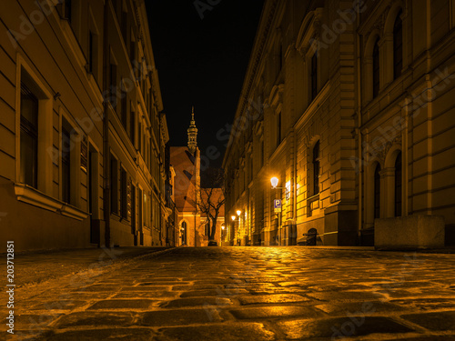 Spooky side street leading towards the Cathedral of Bydgoszcz at night
