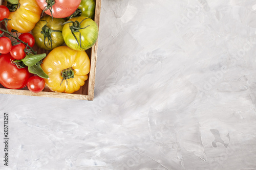 Variety of colorful organic tomatoes. Healthy diet concept photo