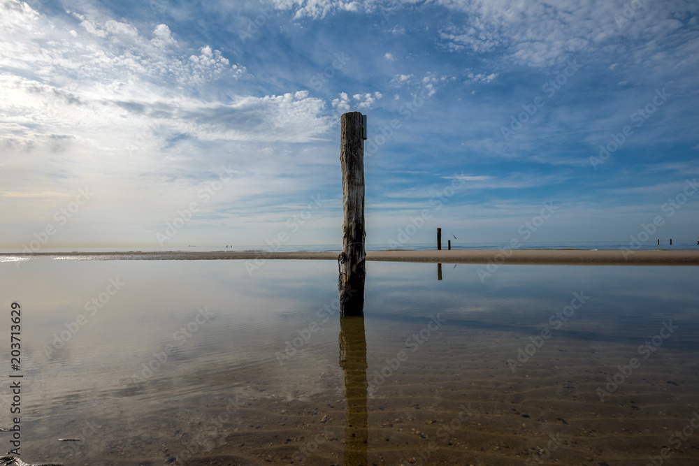 Beautiful Lonely Beach Of Domburg With Waterreflections And Groyne Pillars - Zeeland