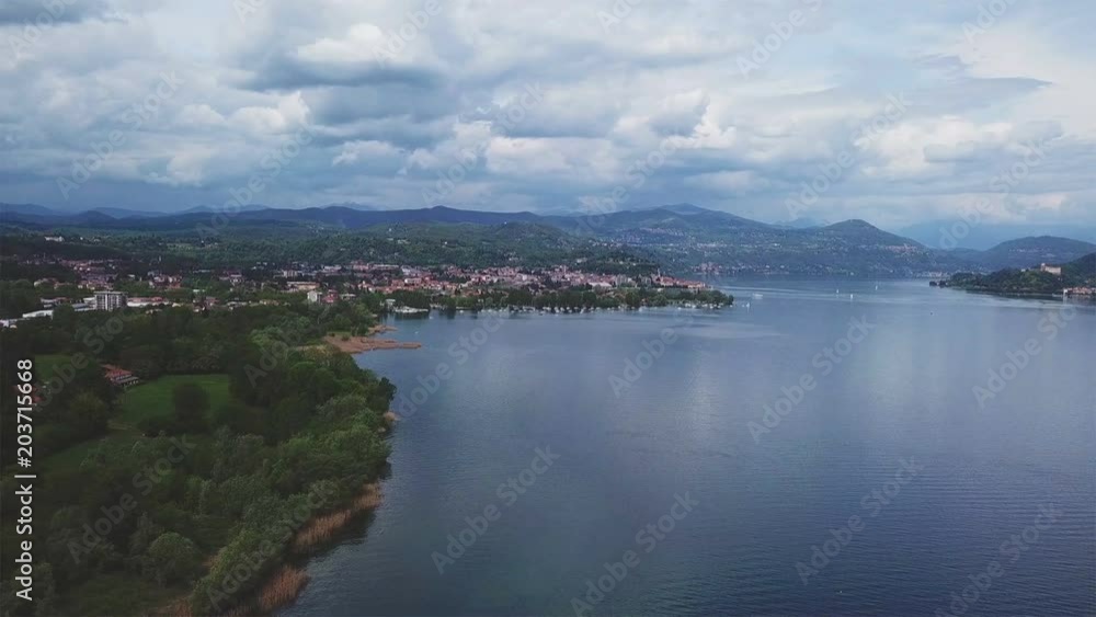 flying over the lake maggiore in italy - lago maggiore aerial cinematic shot from 4k drone
flying over the lake maggiore in italy - lago maggiore aerial cinematic shot from 4k drone