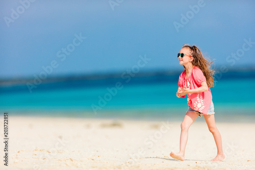 Adorable little girl at beach