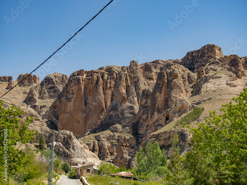 Darende Malatya, Turkey Somuncu father's tomb, blue sky and large rocks photo