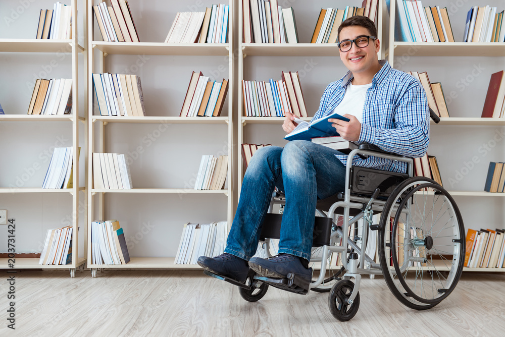 Disabled student studying in the library Disabled student studying in the library