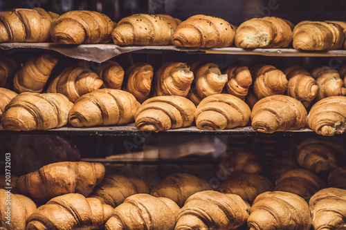 French Croissants on a showcase in a bakery shop