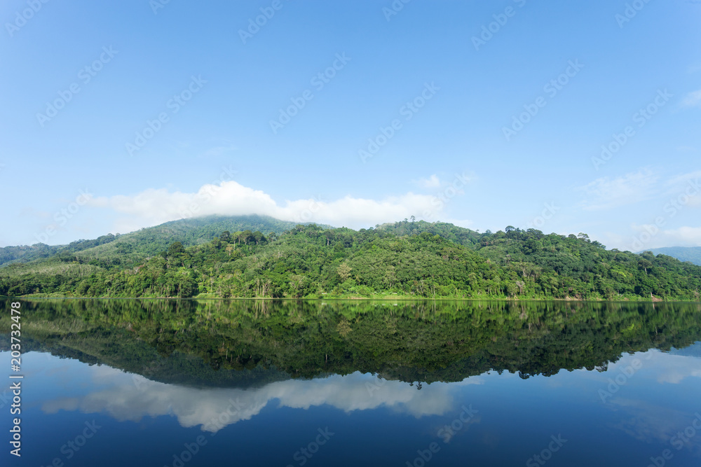 Mountain and Lake with reflex in the water scenery beautiful view with blue sky and clouds in phuket thailand. Mountain and Lake with reflex in the water scenery beautiful view with blue sky and clouds in phuket thailand.