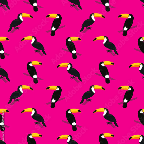 Seamless colorful summer pattern with hand drawn toucan birds on bright pink background. Tropical exotic vector illustration 