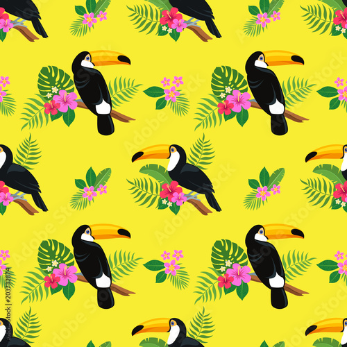 Summer colorful bright seamless hand drawn tropical pattern with toucan birds and exotic plant leaves and flowers of hibiscus and plumeria on yellow background. Hawaiian style. Vector illustration
