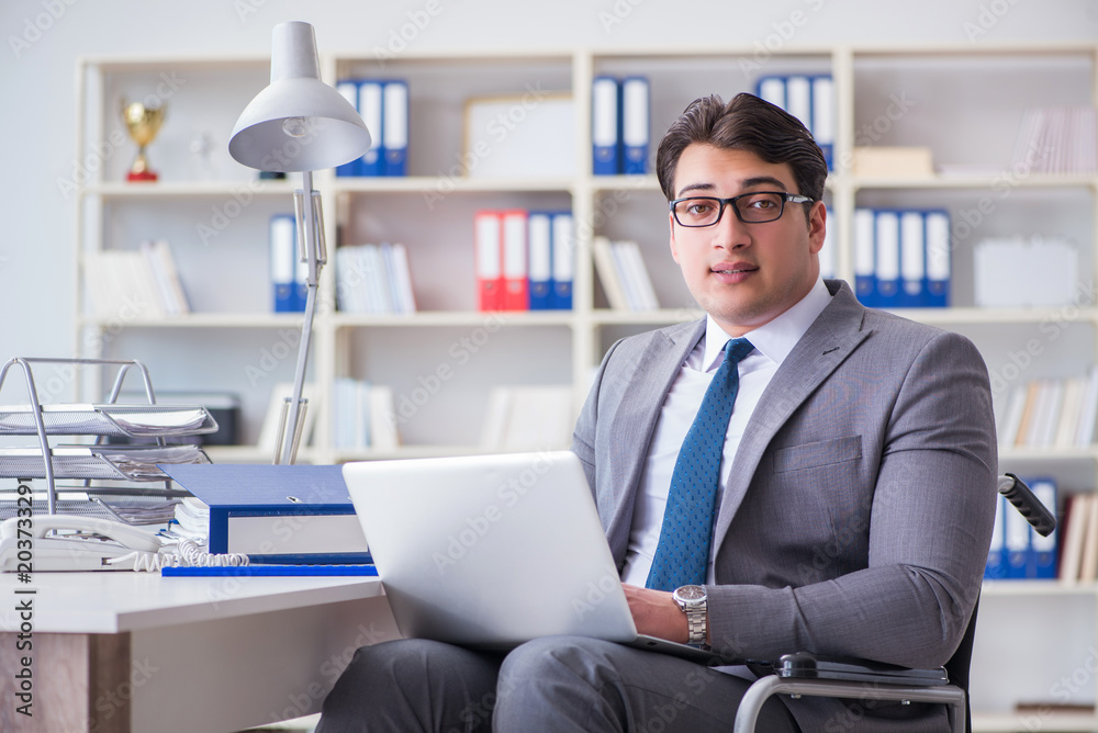 Disabled businessman working in the office Disabled businessman working in the office