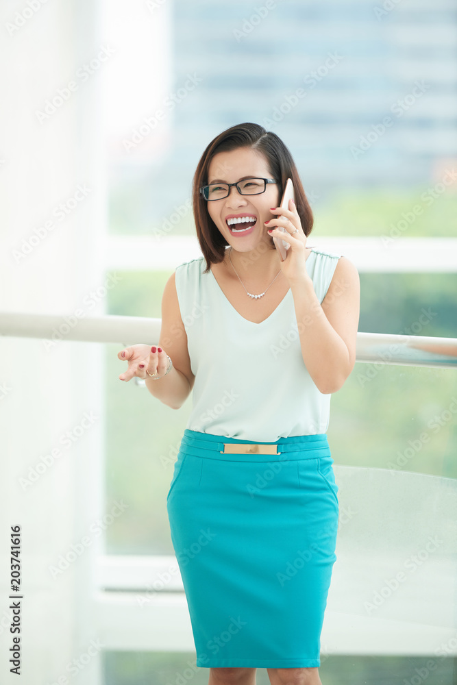 Cheerful business woman on the phone Cheerful business woman on the phone