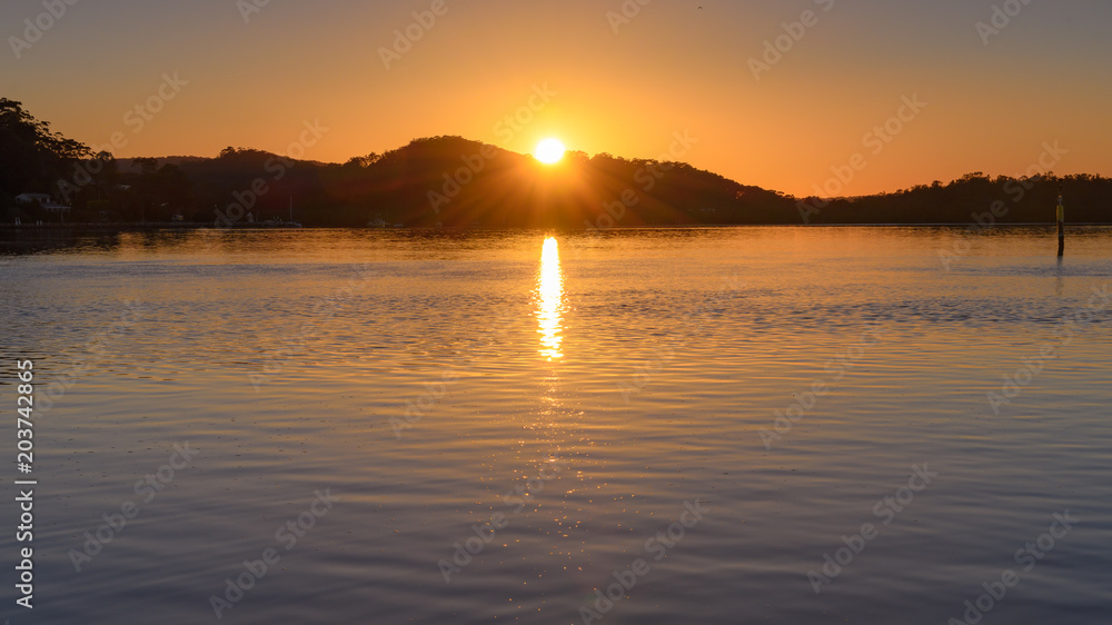 Sunrise Waterscape with Sunburst