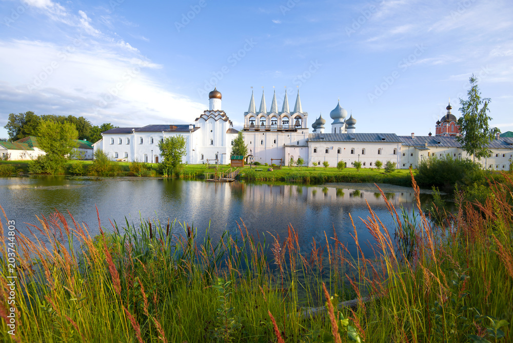 Monastery pond in the Tikhvin Assumption Monastery on a sunny September morning. Tikhvin, Russia