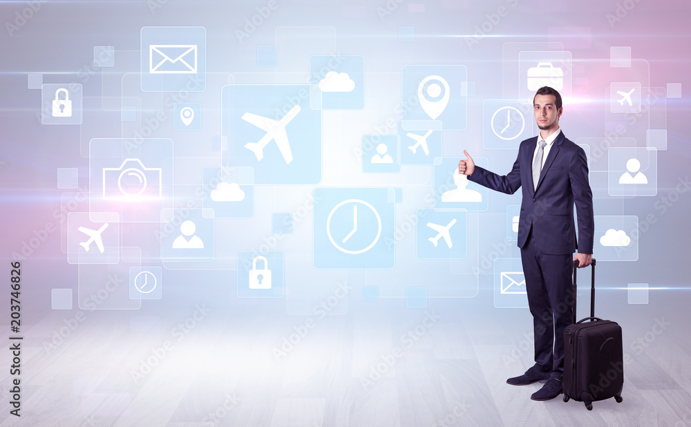 Businessman departs to a business trip with social media and travel symbol concept
Businessman departs to a business trip with social media and travel symbol concept