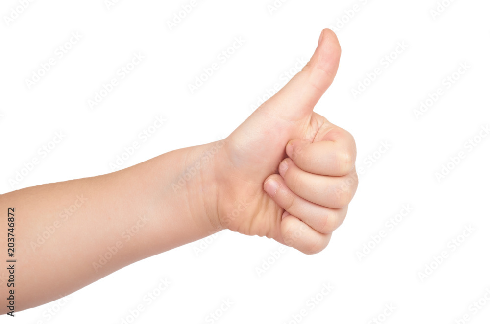 Kid hand shows thumb up gesture, isolated on white background Kid hand shows thumb up gesture, isolated on white background