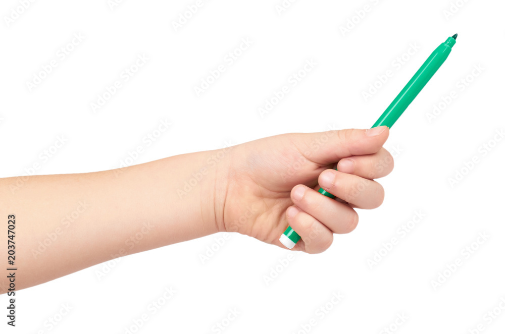 Kid hand hold color felt pen with hand, isolated on white background Kid hand hold color felt pen with hand, isolated on white background