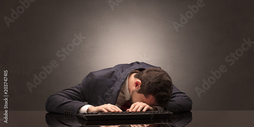 Elegant teacher fell asleep at his workplace with full draw blackboard concept 