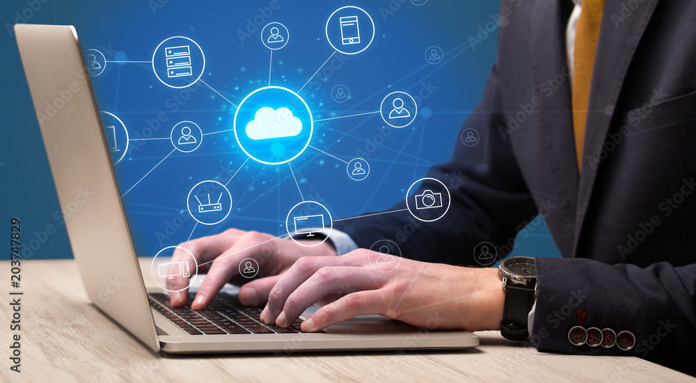 Businessman hand typing with cloud technology system and office symbol concept
Businessman hand typing with cloud technology system and office symbol concept