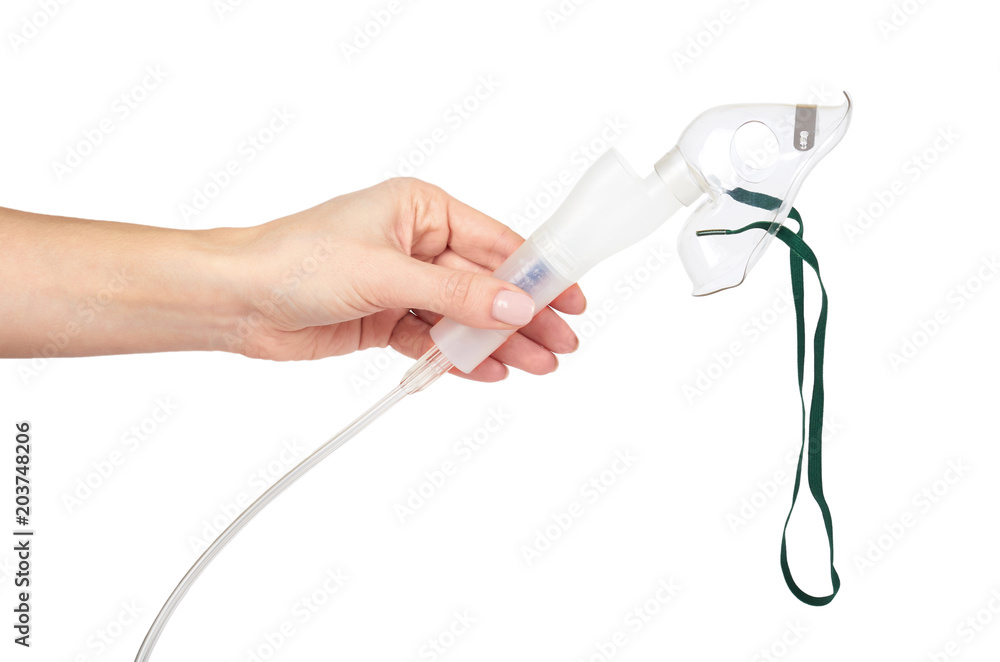 Nebulizer inhaler device, respiratory therapy for family use. Isolated on white background Nebulizer inhaler device, respiratory therapy for family use. Isolated on white background