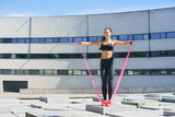 Young and sporty woman training outdoor
