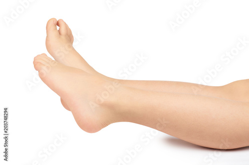 Cute kid leg, fast growing foot, isolated on white background