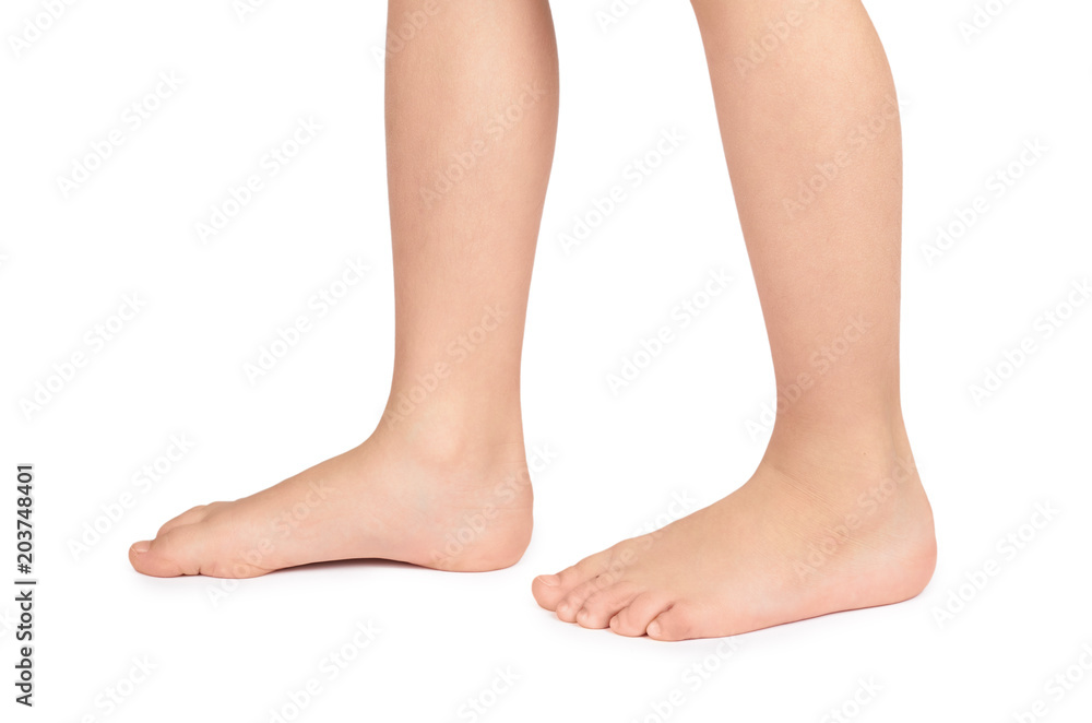 Cute kid leg, fast growing foot, isolated on white background Stock