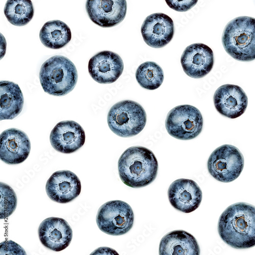 Blueberry pattern. Fresh blue berry fruits isolated on white background, top view.