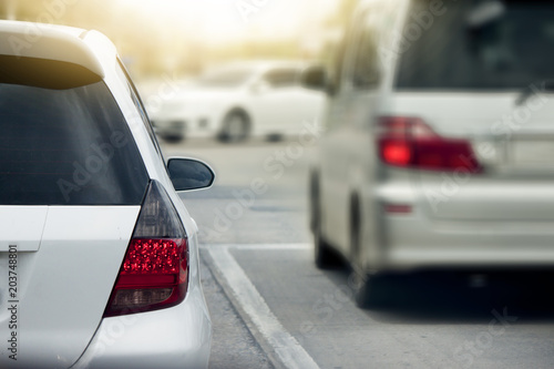 Cars on the road heading towards the goal of the trip and stop by traffic Jame.