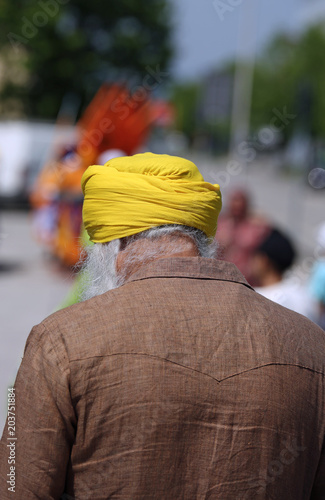 old man with yellow turban with white beard