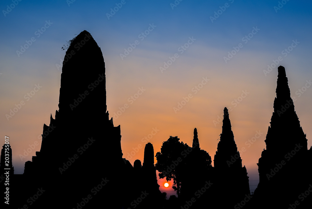 Ayutthaya history park silhouette with sunset sky.