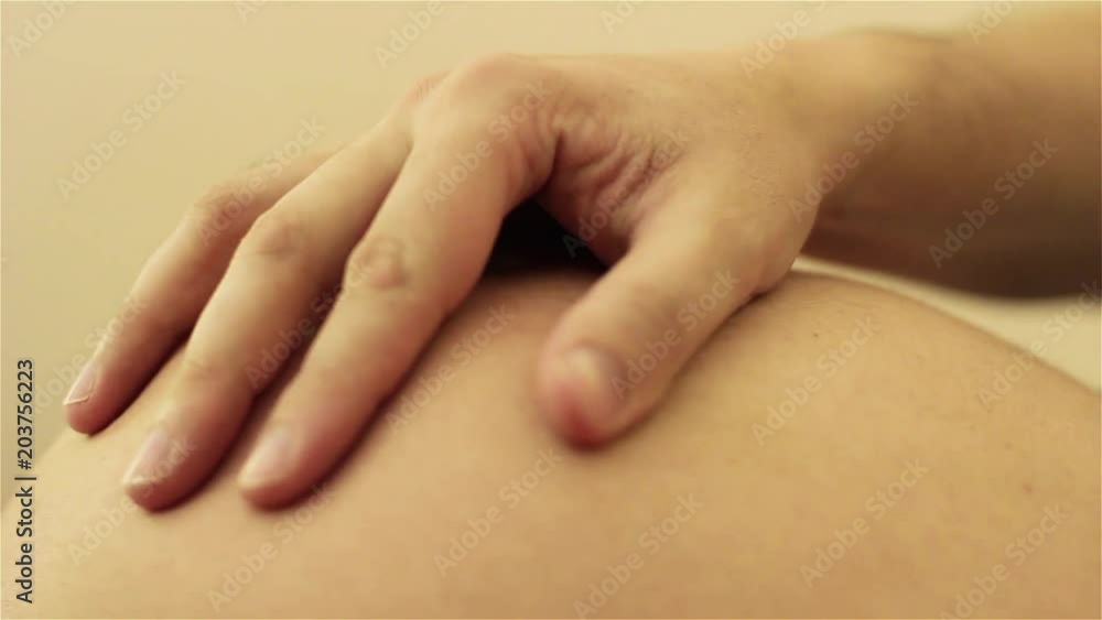 Male Hand on Pregnant Tummy. Pregnant Couple Caressing Pregnant Belly. 