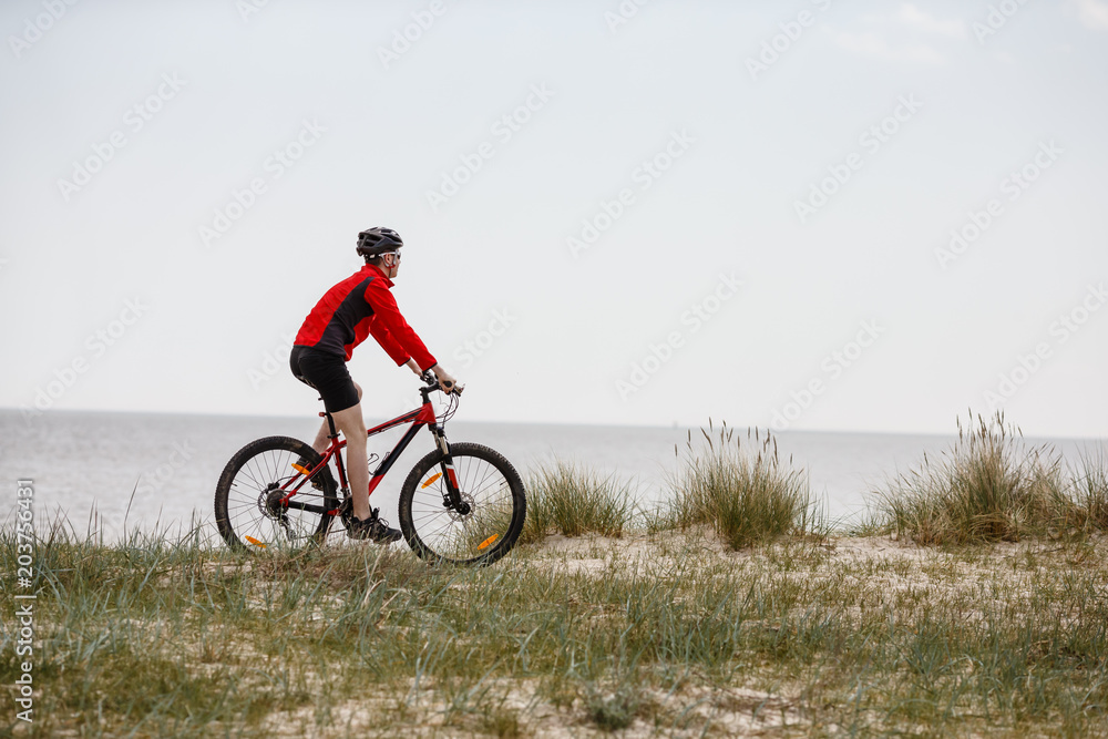 Young man biking