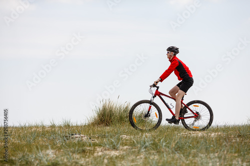 Young man biking