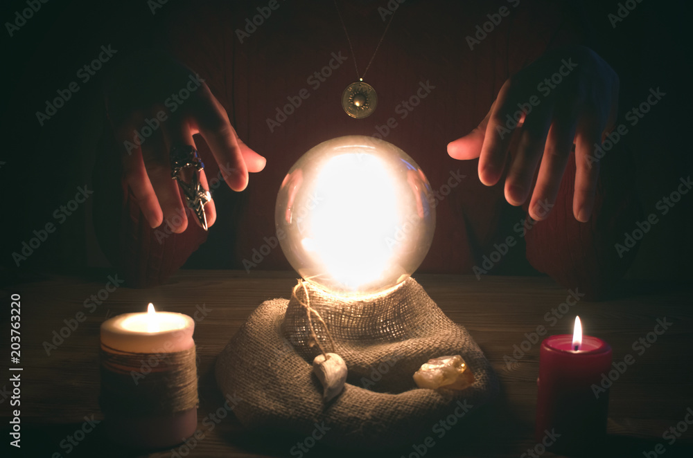 Crystal ball and fortune teller hands. Divination concept. The spiritual  seance. Future reading. Photos | Adobe Stock