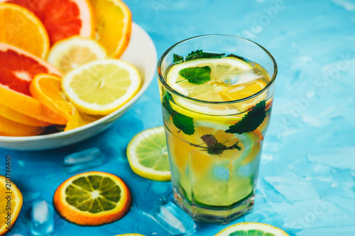 lemonade or cocktail of citrus with mint and ice