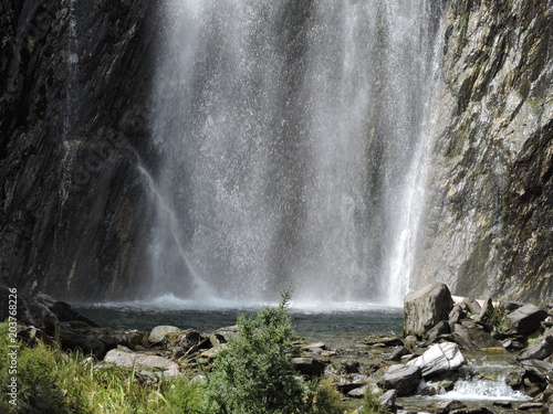 Large waterfall on a rock wall  New Zealand