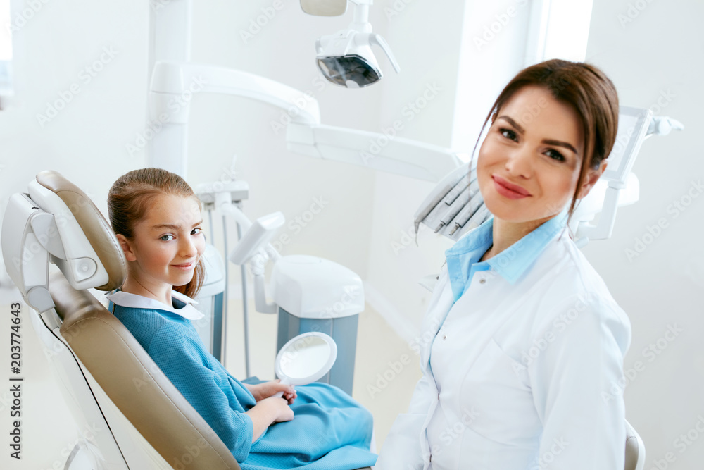 Dentistry. Dentist Doctor And Patient In Clinic Dentistry. Dentist Doctor And Patient In Clinic