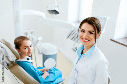 Dentistry. Dentist Doctor And Patient In Clinic