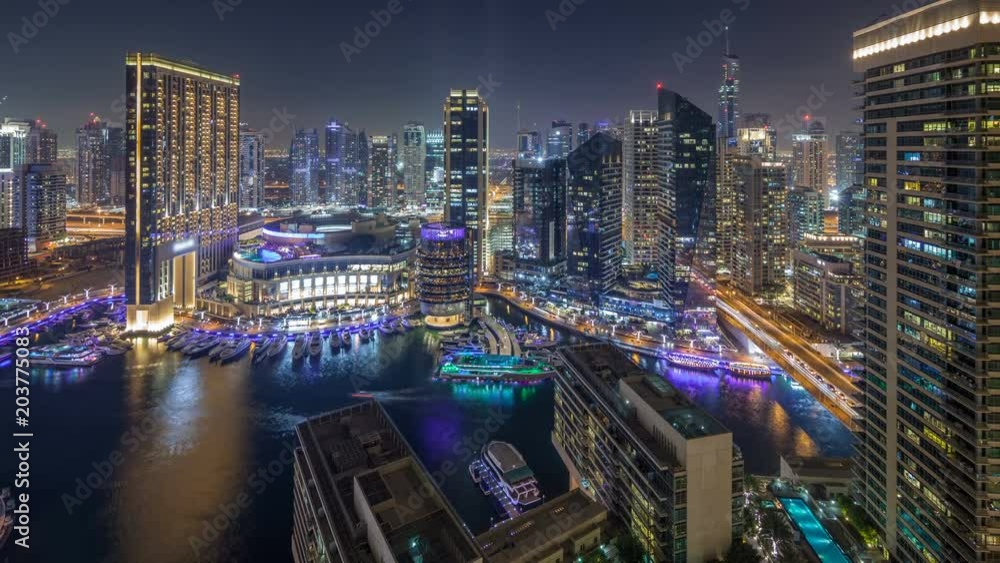 Night illumination of Dubai Marina aerial timelapse, UAE. Night illumination of Dubai Marina aerial timelapse, UAE.
