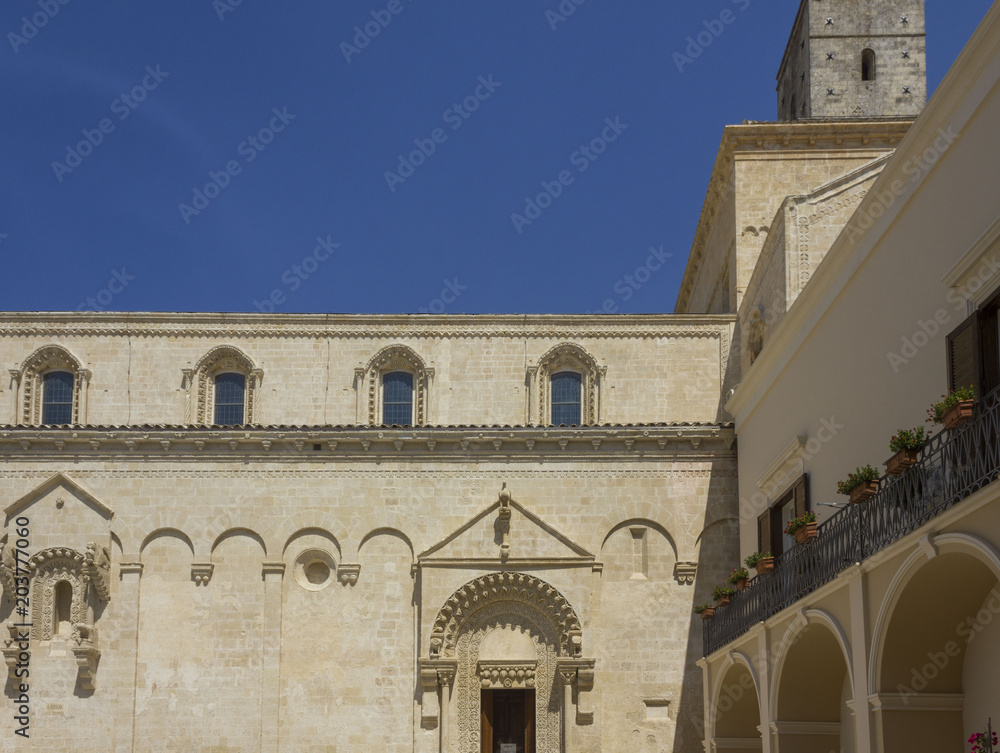 Architectural feature of the lateral facade of Matera Cathedral and its bell tower