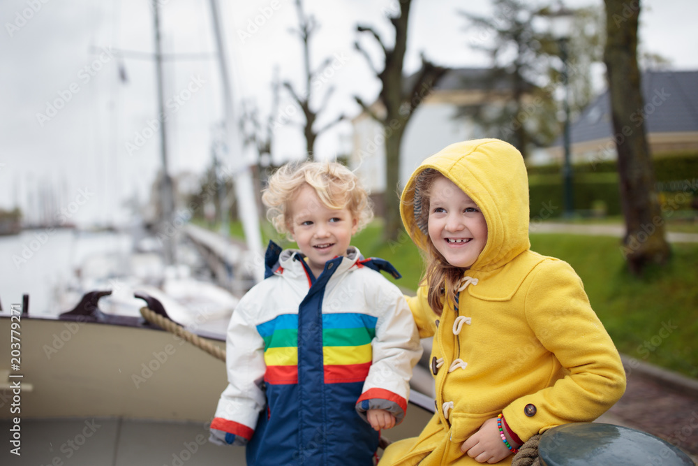 Kids on wooden boat in Holland Kids on wooden boat in Holland