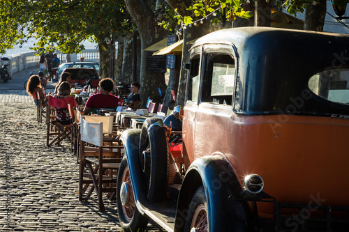 Tableau sur toile Old car parked in historic quarter in Colonia del Sacramento, Uruguay