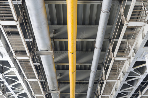 modern industrial bridge with pipes. background