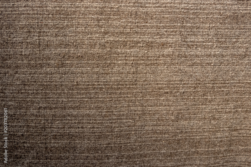 Texture of a very fine woven fabric background Texture of a very fine woven fabric background