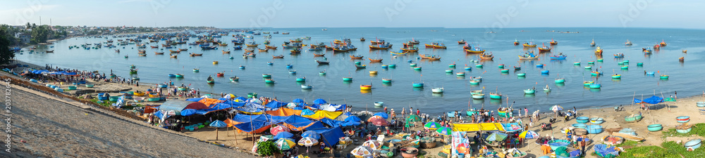 Many Traditional Vietnamese boat in the basket shaped at Fishing village in Mui Ne, Vietnam, Southeast Asia